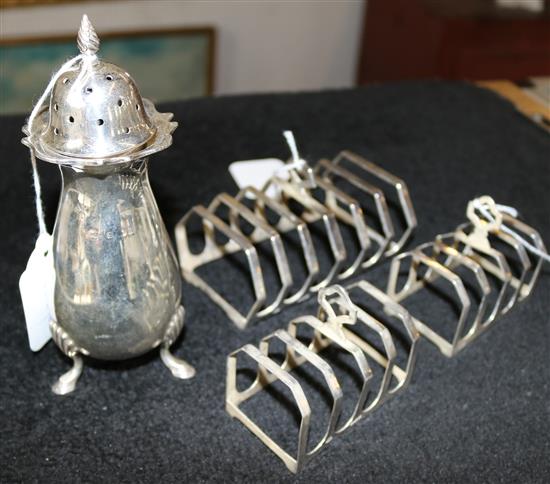 Silver toast rack, pair of small silver toast racks and a silver sugar caster